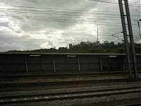 Alexandra Palace, from a train window. Overhead...the storm clouds gather...