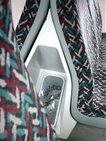 A strange and sexual looking dustbin on a WAGN train