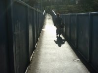 A friend walking along the bridge over Alexandra Palace station