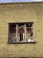 A broken window in a Holloway backstreet. 