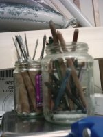 Jars of pencils and woodcutting tools. My heirloom.