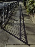 The railing shadows. 