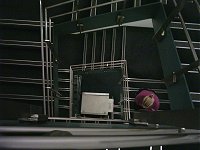 Looking down on someone from an office stairwell.