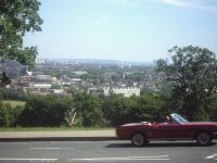 A car speeds past Ally Pally. 