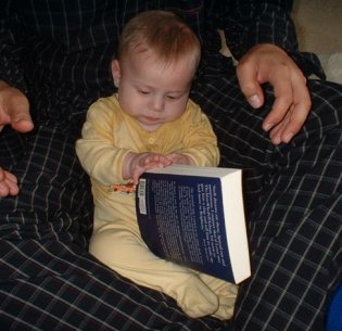 Adin reading the book.